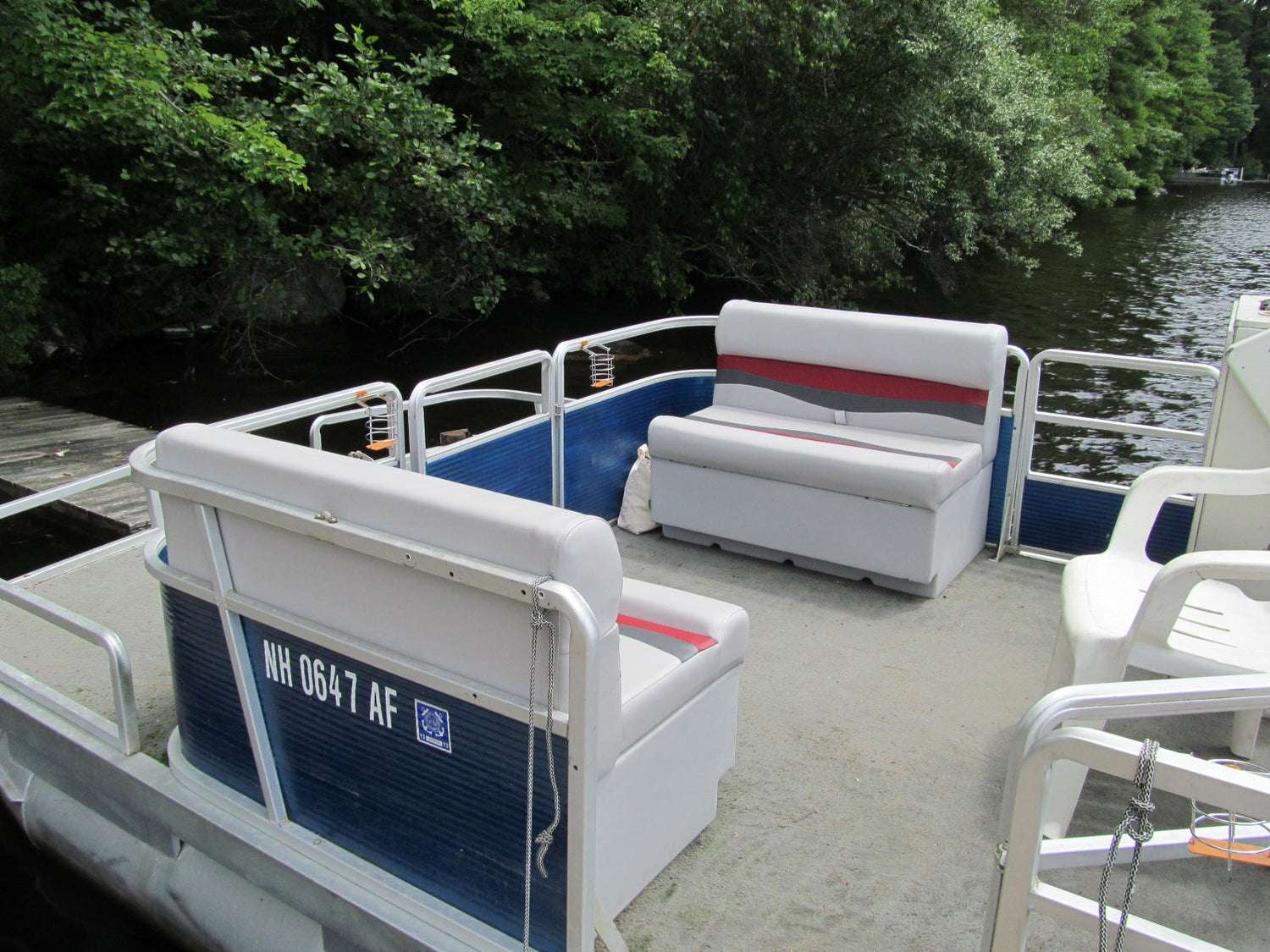 Replacing the front bench seats on a pontoon boat.